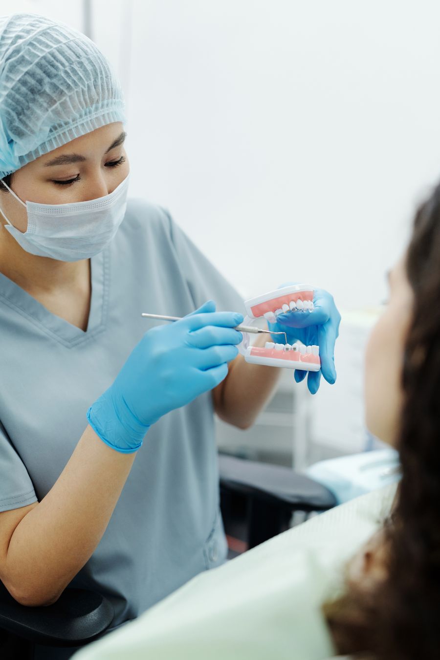 Dentist consulting a patient about treatment options