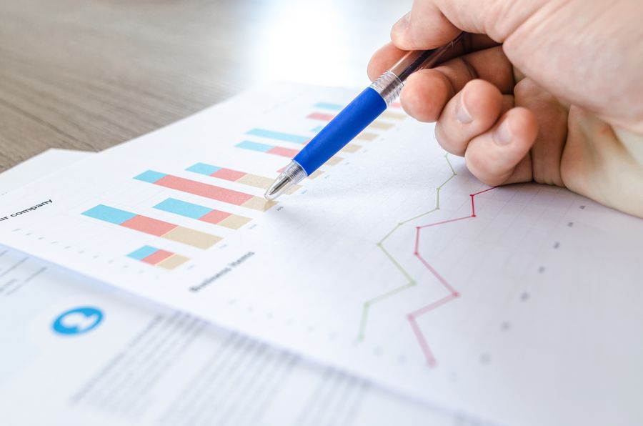 Marketer reviewing campaign performance charts
