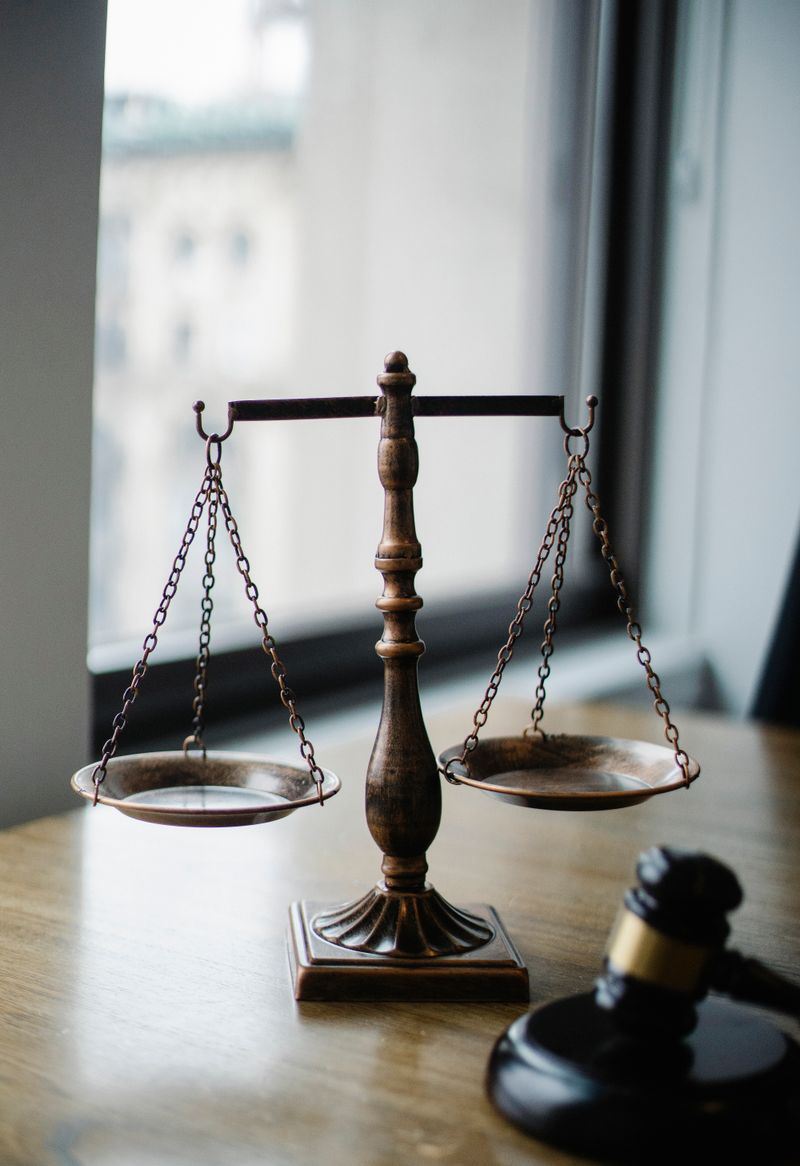 Scales of justice on a lawyer's desk